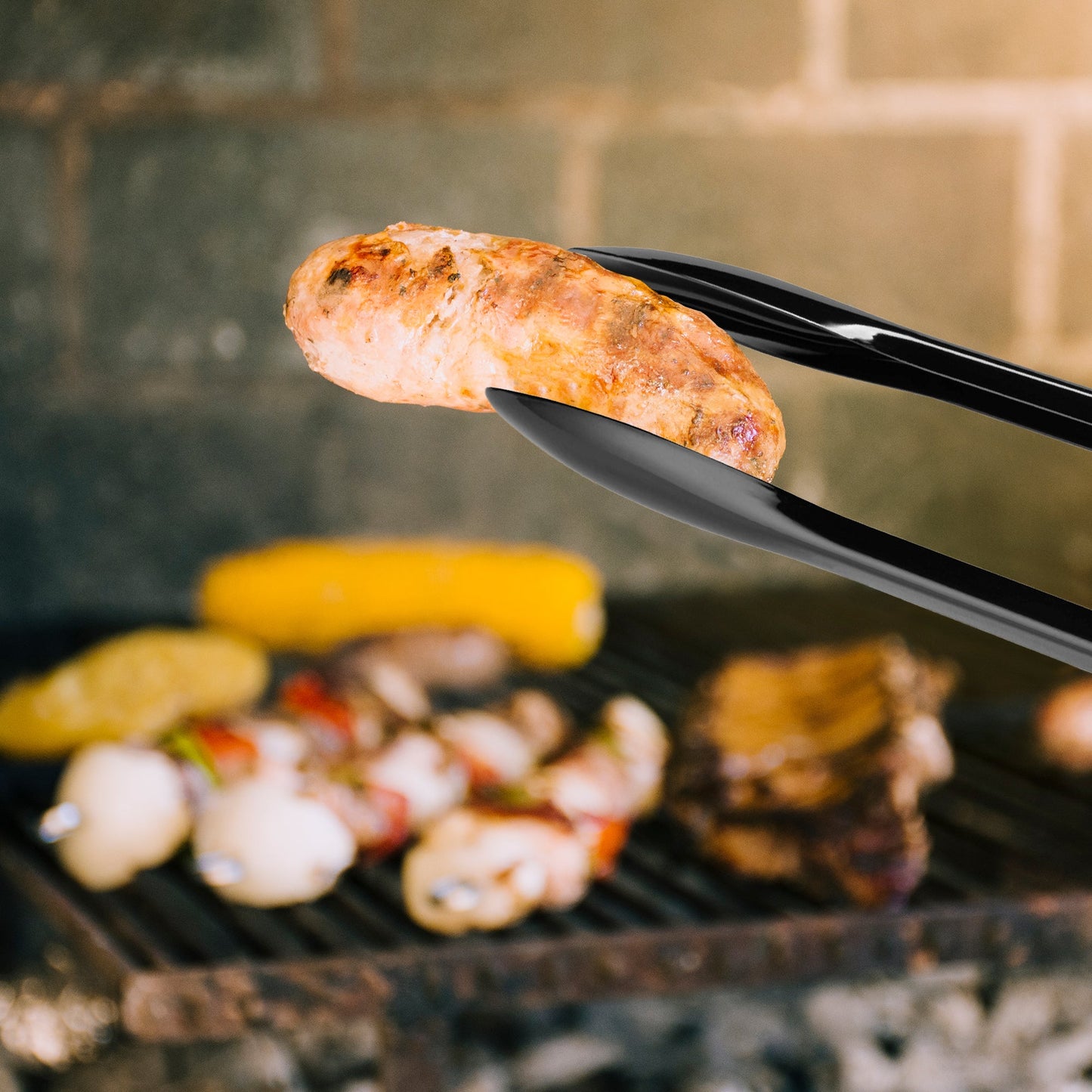 12" black tongs were perfect for serving heavier food like chicken or pasta during catering.