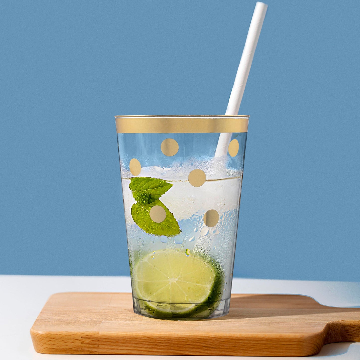 12 oz. Clear with Gold Dots tumblers arranged at a festive table, adding sparkle to a drink station