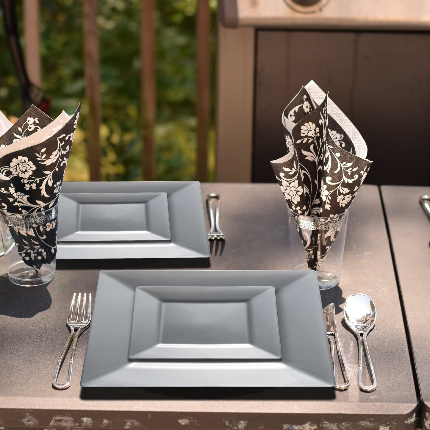 6.5" silver plates held salads and starters during a New Year’s Eve dinner.