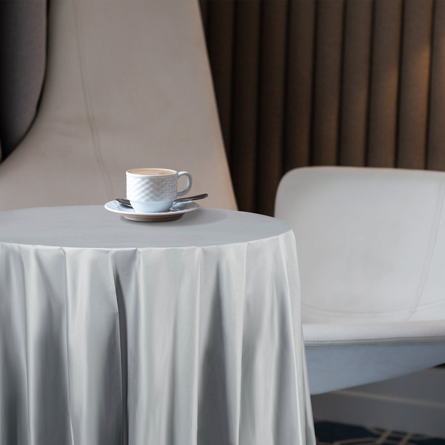 84" silver tablecloths protected surfaces while adding shine to formal setups.