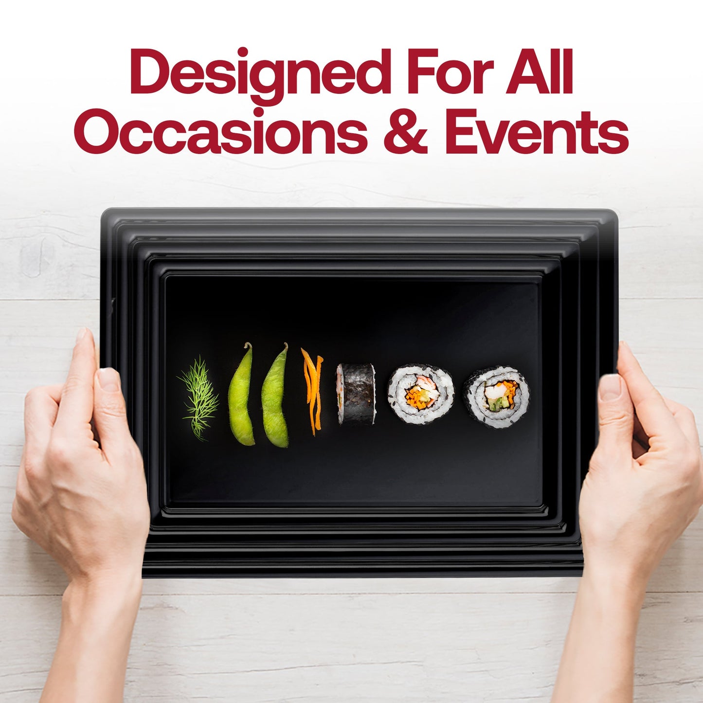 Black serving tray used at an outdoor event, holding a variety of finger foods and snacks for casual gatherings