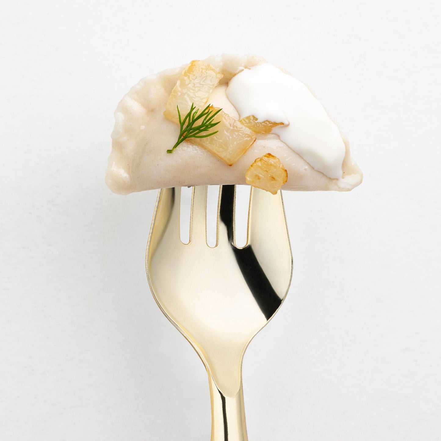 Case of 60 gold plastic serving forks, 9.75 inches long, durable and disposable for effortless serving.