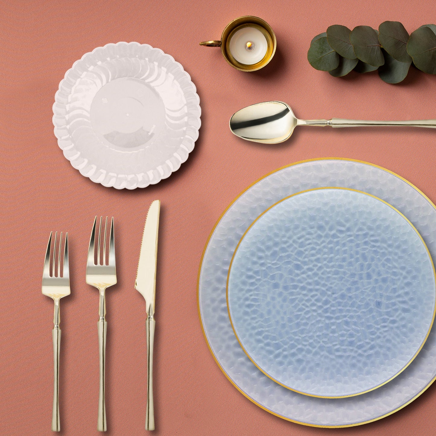 Clear Blue with Gold Rim Hammered Glass Tableware Set used at a beach wedding reception.