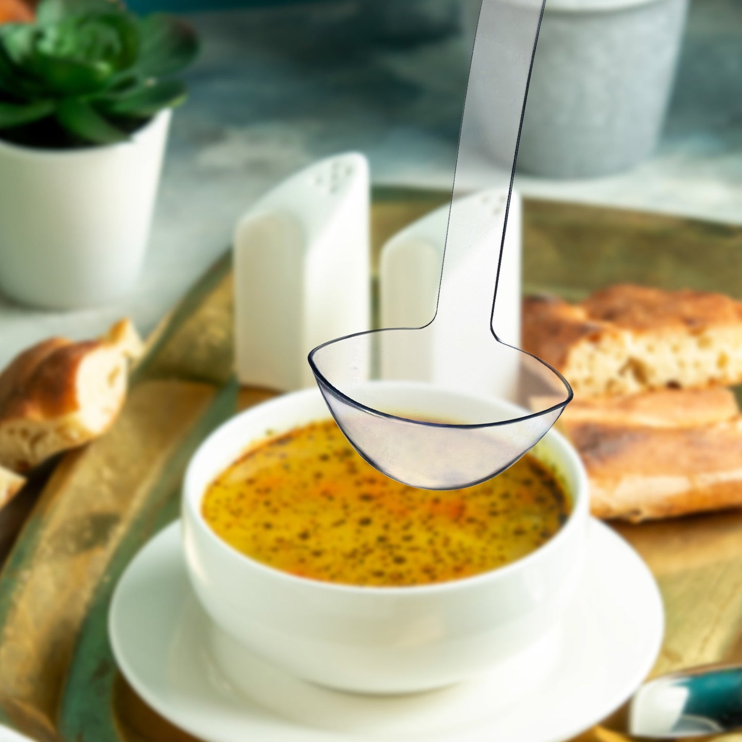 Clear Plastic Ladles were used to serve soups and punch at a formal dinner service.