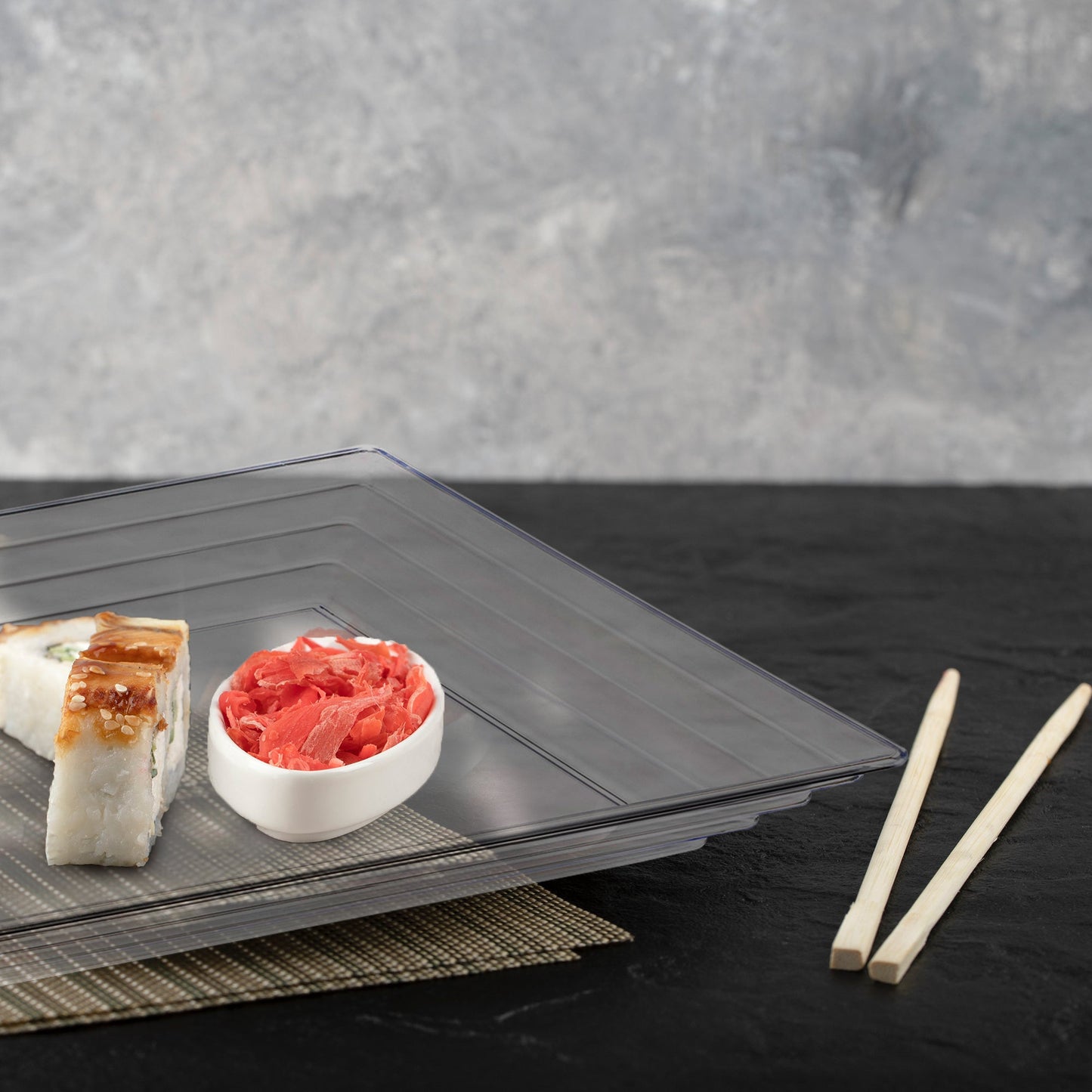 Clear Plastic Serving Trays showcased colorful snacks at a transparent table setting.
