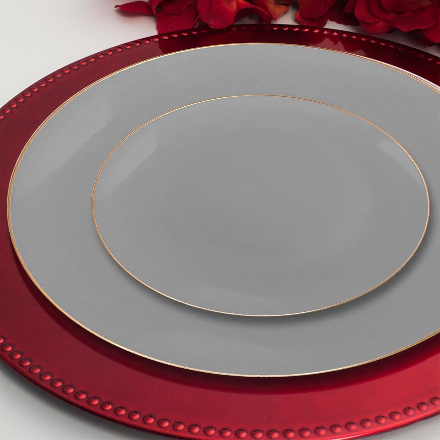 Create a sleek and elegant atmosphere at your wedding with the Gray with Gold Organic Round Disposable Plastic Wedding Value Set, designed for high-end events and memorable celebrations