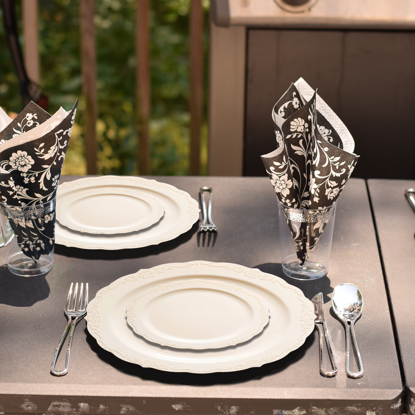 Entrees were served on 10" ivory plates at an event with vintage-style decorations.