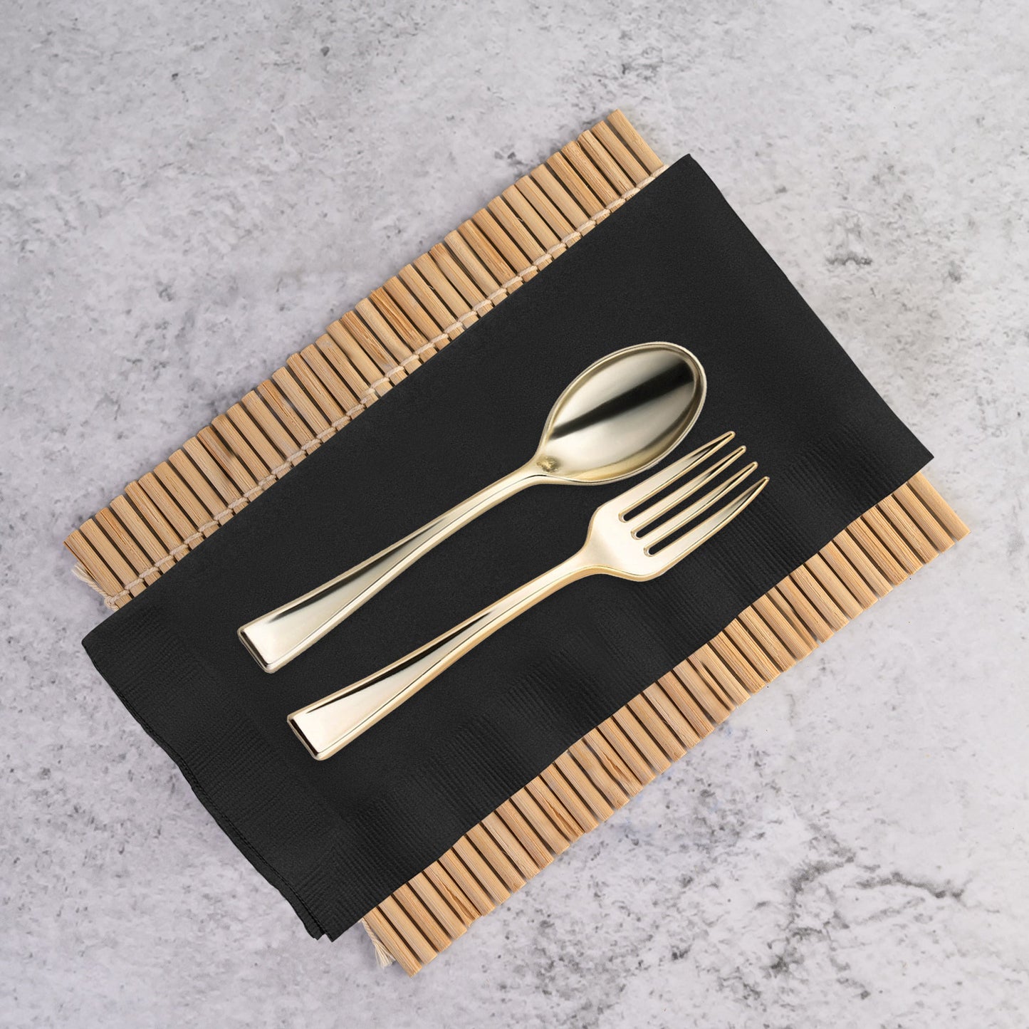 Folded black velvet dinner napkin in luxe paper, measuring 16 x 16 inches when opened, sold as a 600-piece set.