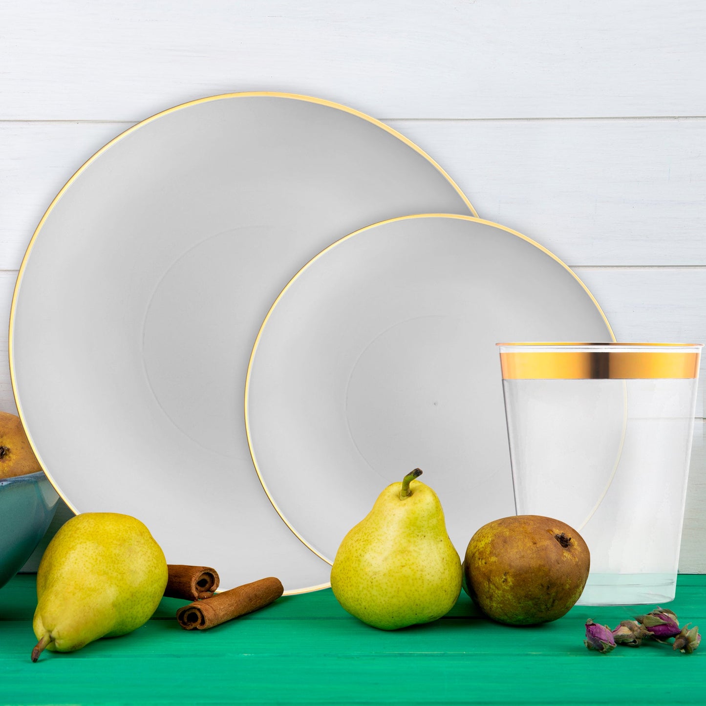 Gray with Gold Organic plates paired with deep green accents at a fall wedding.