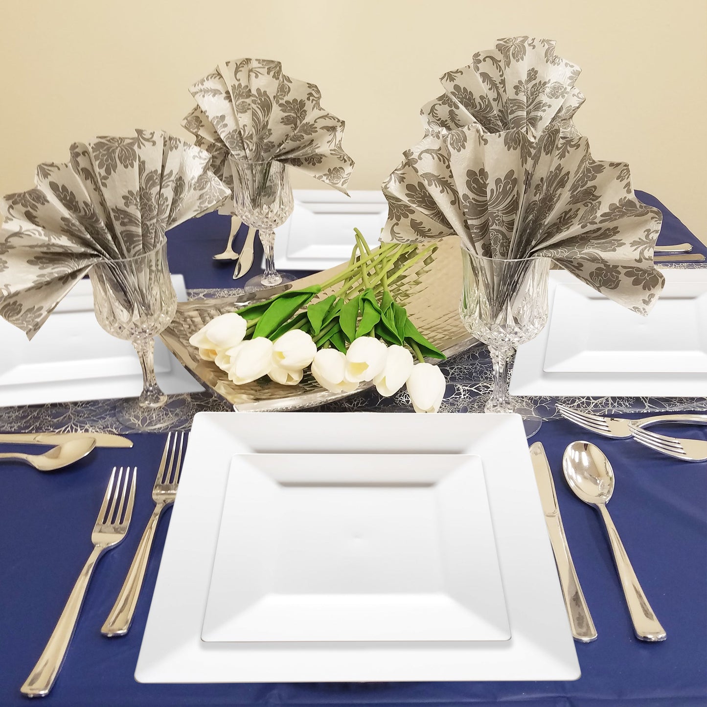 Guests sampled pastries from White Square Pastry Plates at a baby shower with white floral decor