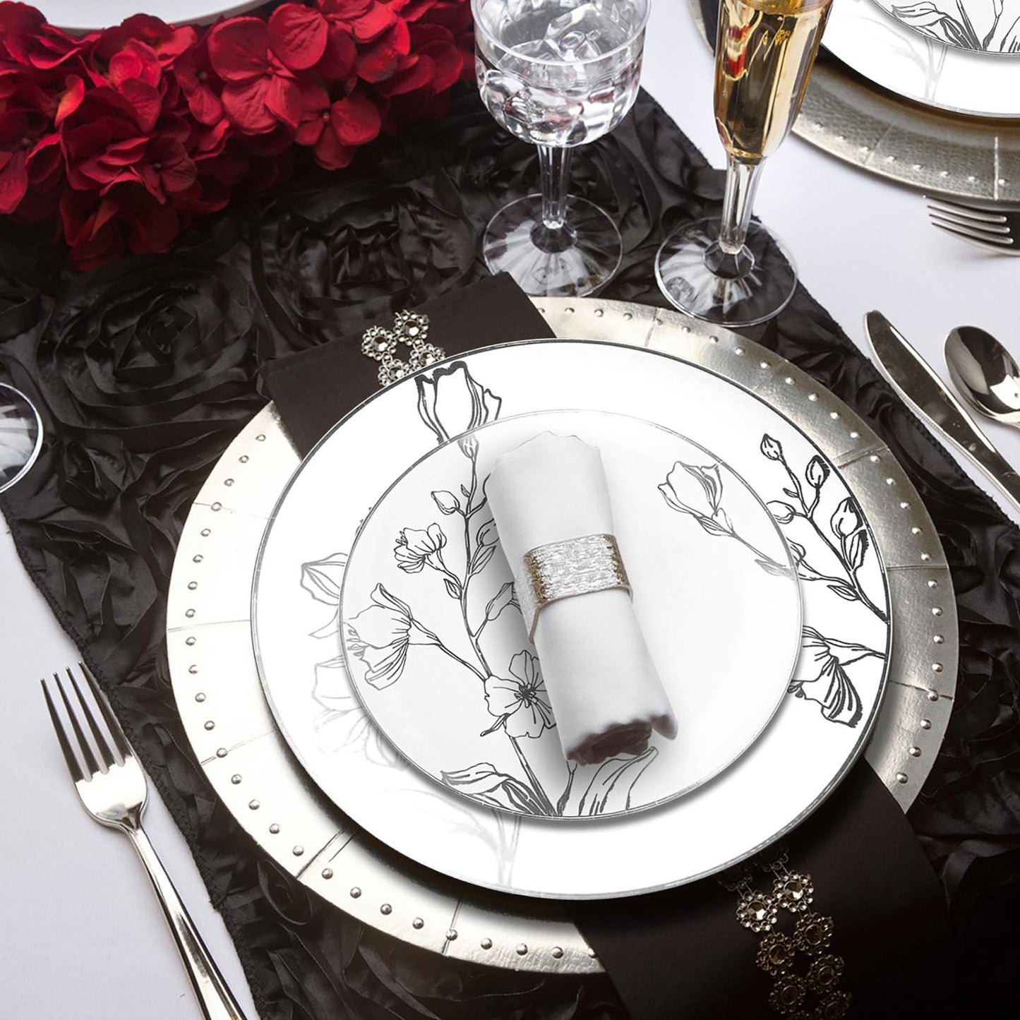 Impress your guests with the graceful design of the White with Silver Antique Floral Round Disposable Plastic Wedding Value Set, great for adding a touch of vintage elegance to your wedding