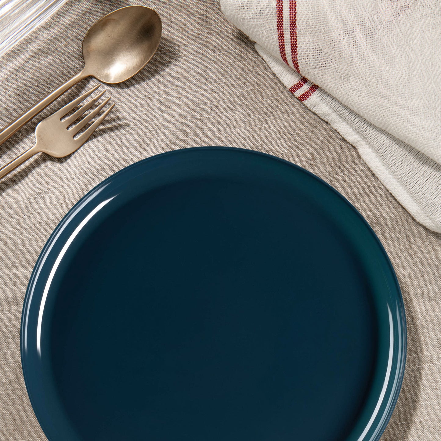Navy Flat Dinner Plates held steak and vegetables at an elegant evening dinner with deep-toned decor