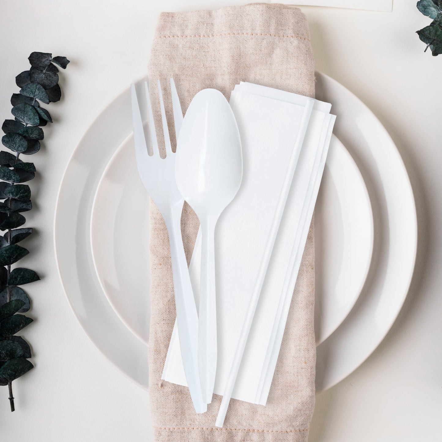 Portable MW utensil kit with a straw and napkin simplifies food service on the go