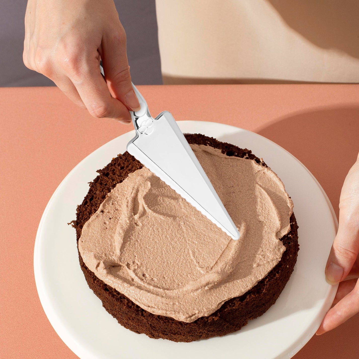 Shiny Silver Cake Lifters provided sleek serving for cakes at milestone celebrations.