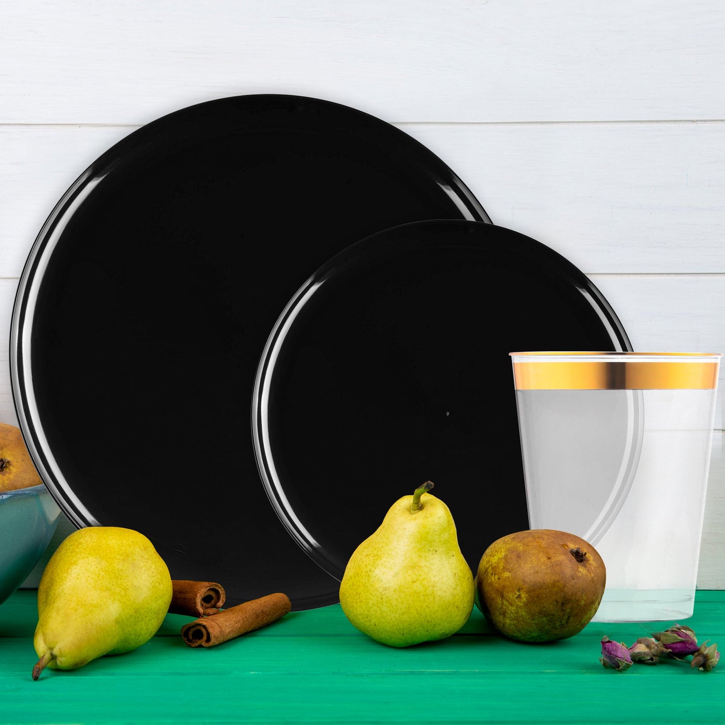 Sleek black plastic tableware offering a modern touch to upscale event tables.