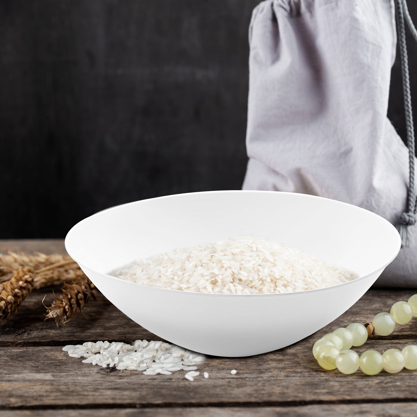 Solid White Organic Round Disposable Plastic Soup Bowl (16 oz.) filled with a generous serving of steamed white rice