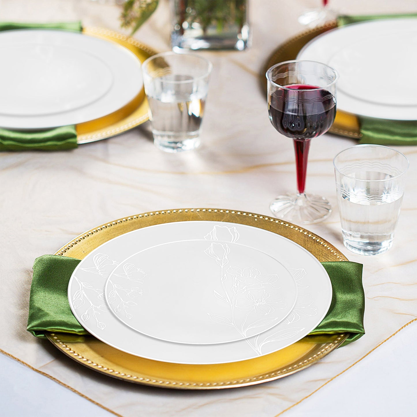 The White with Silver Antique Floral Round Disposable Plastic Wedding Value Set offers the ideal size and quantity for your event, making sure you have all the tableware needed for your guests