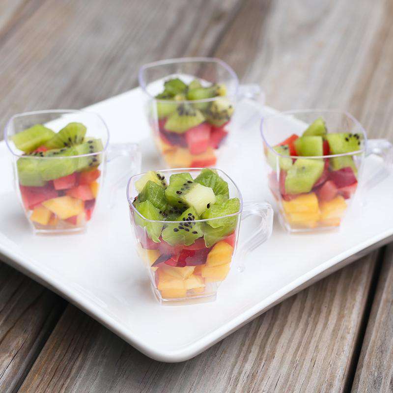 Versatile 2 oz. clear plastic square mini cups, perfect for serving hot or cold beverages, great for parties, catering, and elegant presentations