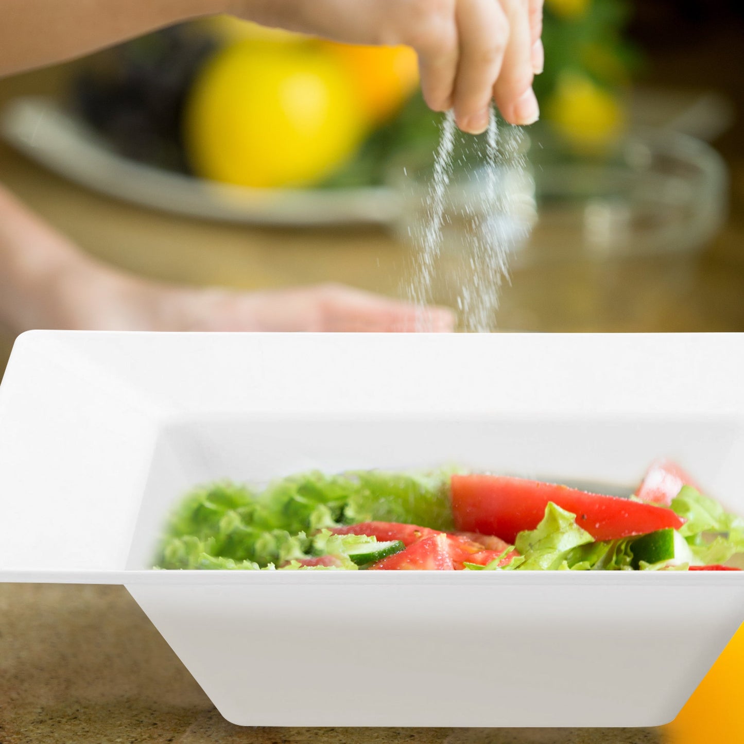 White Square Plastic Dessert Bowl (5 oz.) holding a mix of meat, rice, and broccoli on a table setting