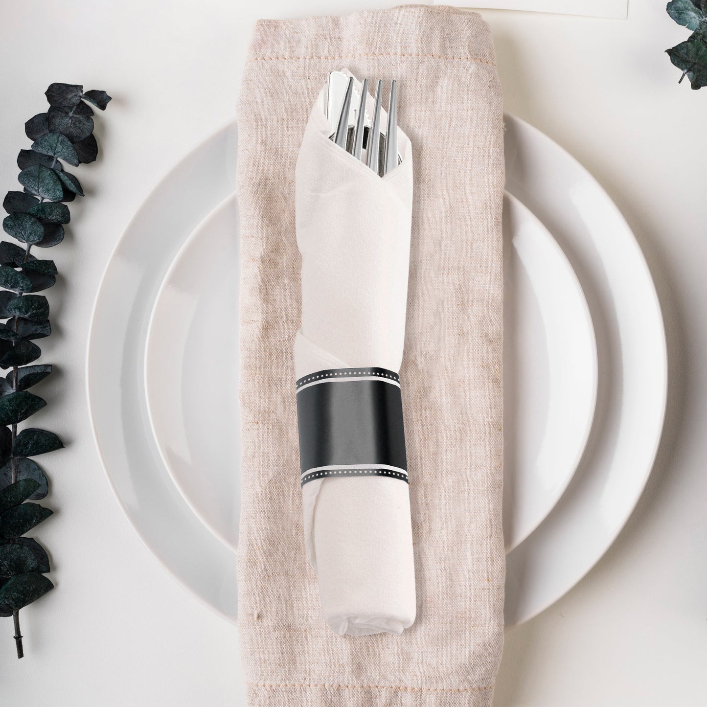 adds a stylish accent to formal and casual gatherings Silver Plastic Cutlery in White Napkin Rolls Set - 10 Napkins, 10 Forks, 10 Knives, 10 Spoons and 10 Paper Rings