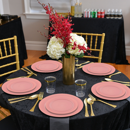 7.5" matte fuchsia plates used in a party layout with fresh fruit, pink napkins, and glassware