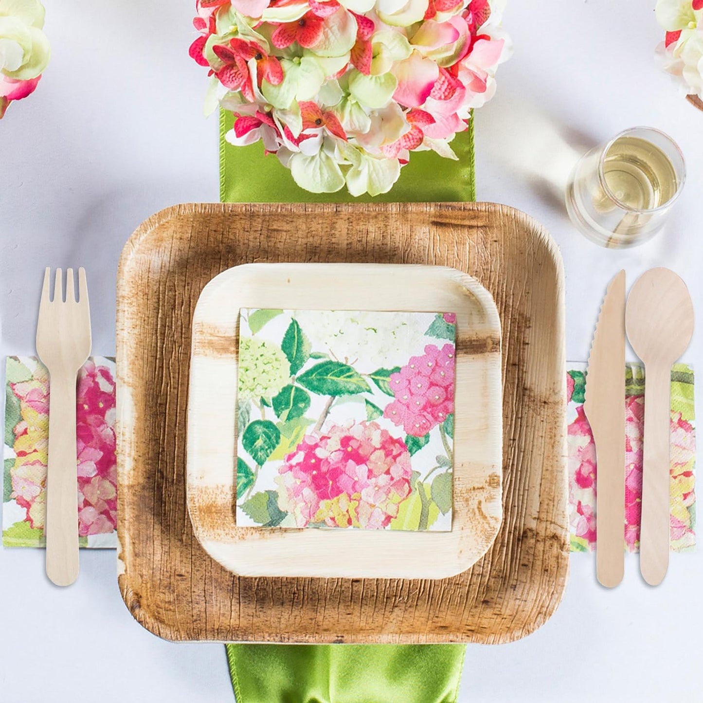 Chic wedding scene using the Square Palm Leaf Disposable Wedding Set, ideal for earthy, sustainable events