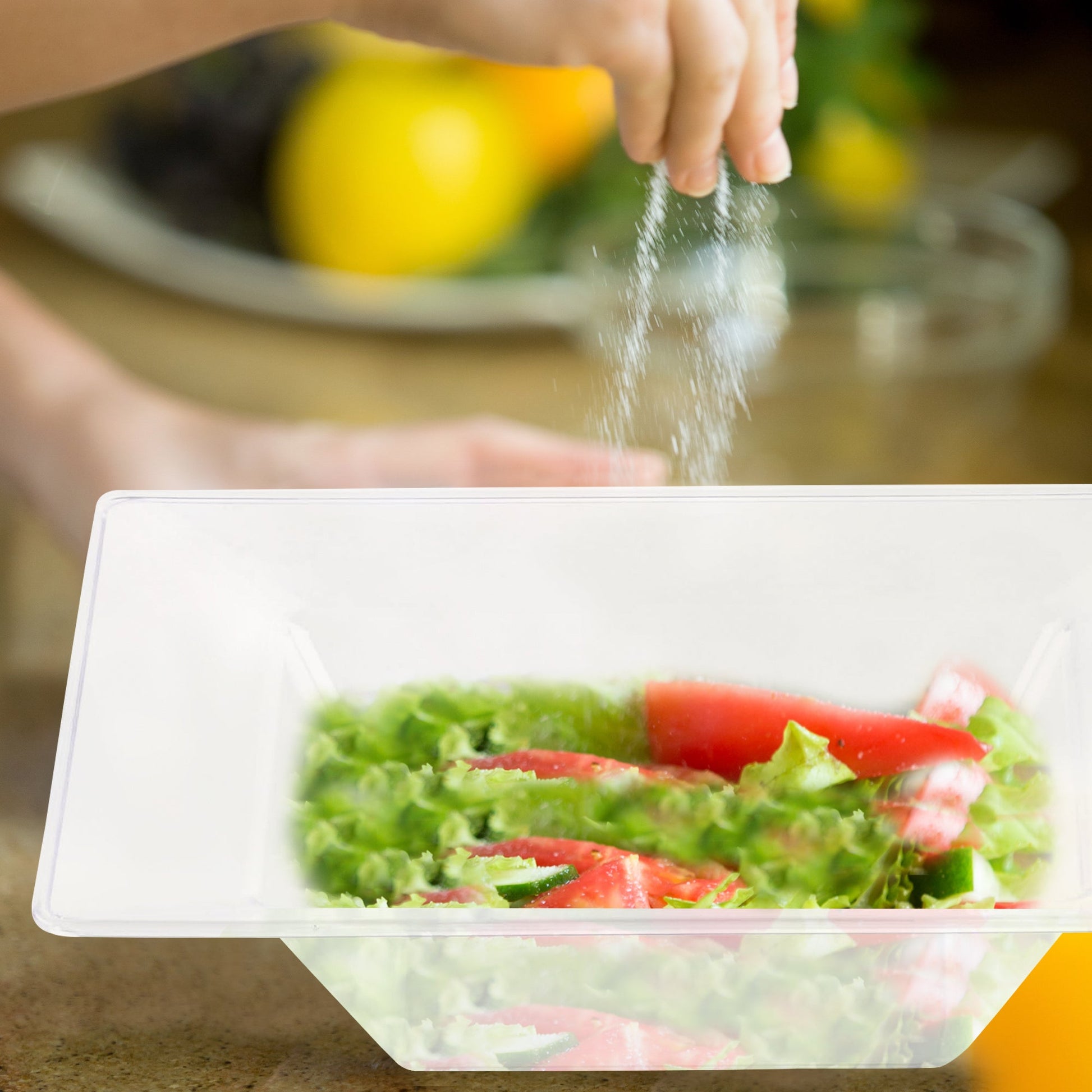 Clear Square Plastic Soup Bowl (12 oz.) filled with a hearty combination of meat, steamed rice, and fresh broccoli