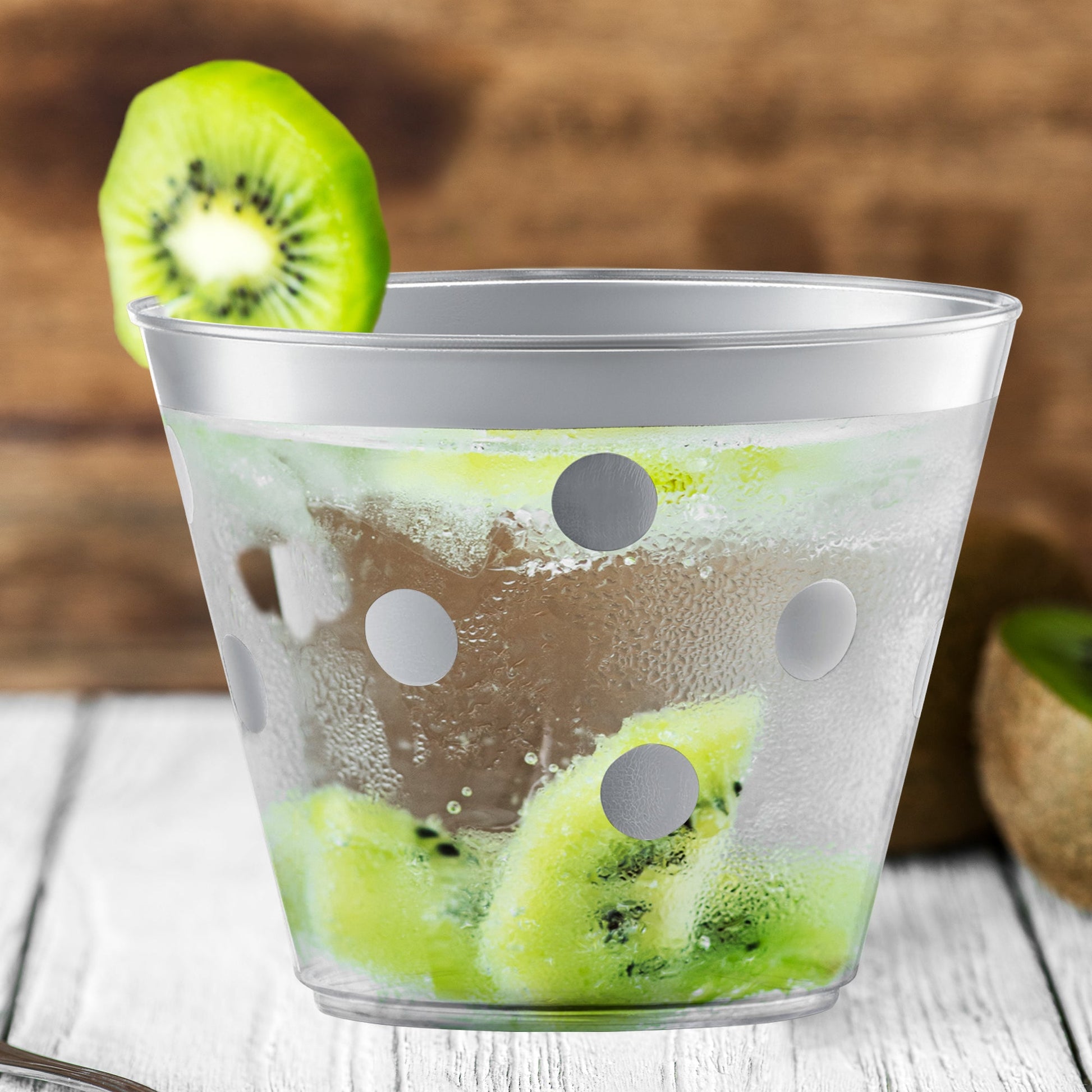 Clear with Silver Dots Round Disposable Plastic Party Cup with dotted metallic pattern for festive drink service
