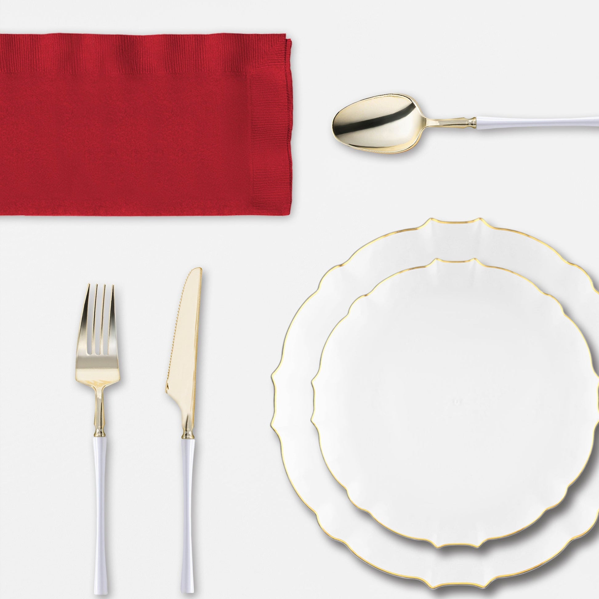 Guests enjoy Thanksgiving dinner served on clear lotus plates and gold-rimmed tumblers under warm lights.