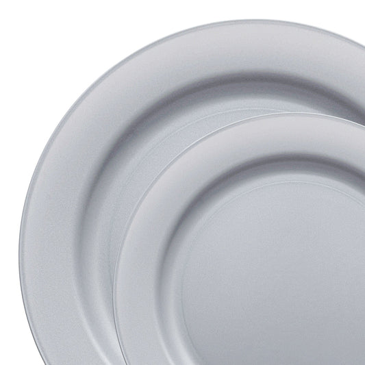 Matte steel gray round disposable plastic dinnerware set with dinner plates and salad plates, ideal for elegant and modern events