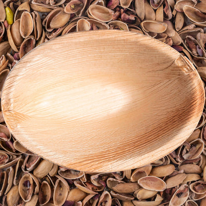 Modern event scene featuring Oval Palm Leaf Eco Friendly Bowls — perfect for appetizers, tastings, and organic themes