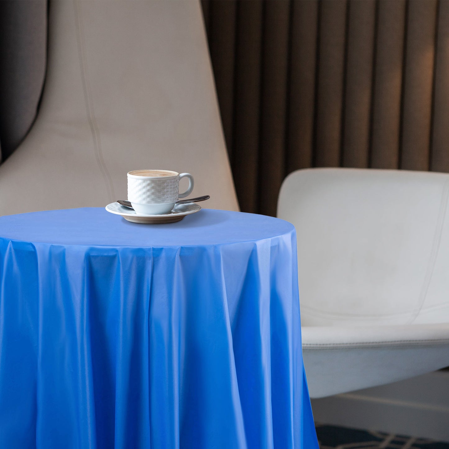 Navy Blue Tablecloths covered round tables at nautical and evening-themed events.
