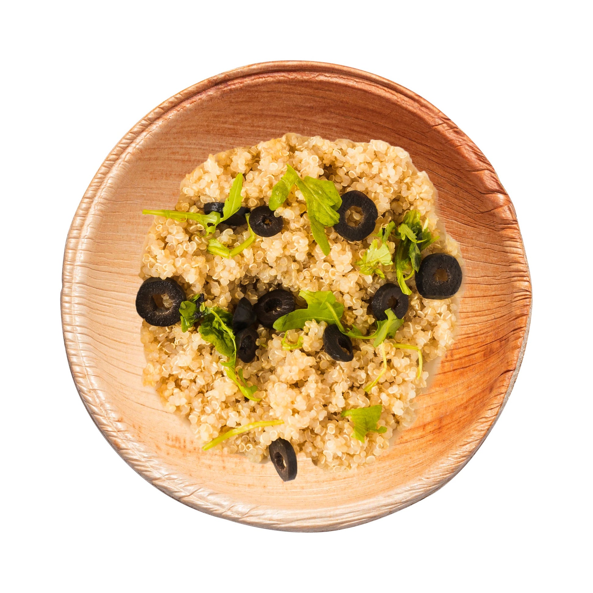 Palm leaf mini bowl filled with fresh hummus and cucumber slices, ideal for healthy individual servings