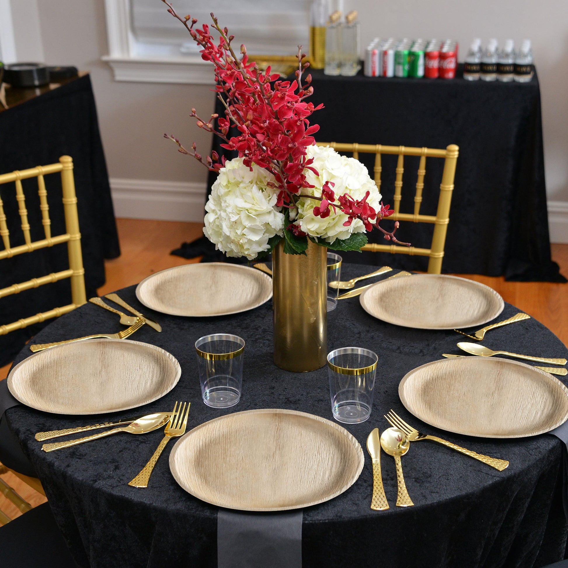 Tabletop scene includes Round Palm Leaf Eco Friendly Disposable Platters with stylish decor