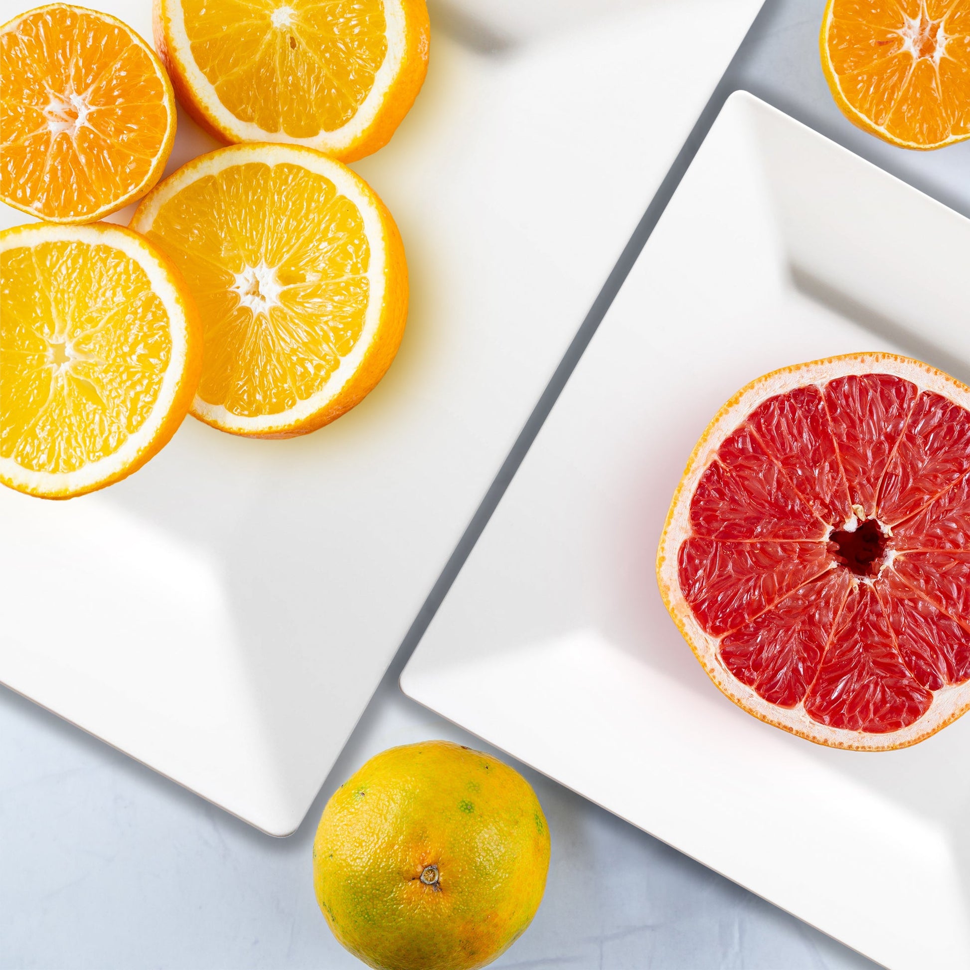 These 4.5" white plates held bite-sized desserts during a soft-toned brunch