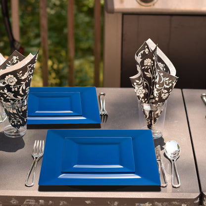 These 6.5" blue cake plates held cupcakes and sweets during a formal reception with dark-toned decor