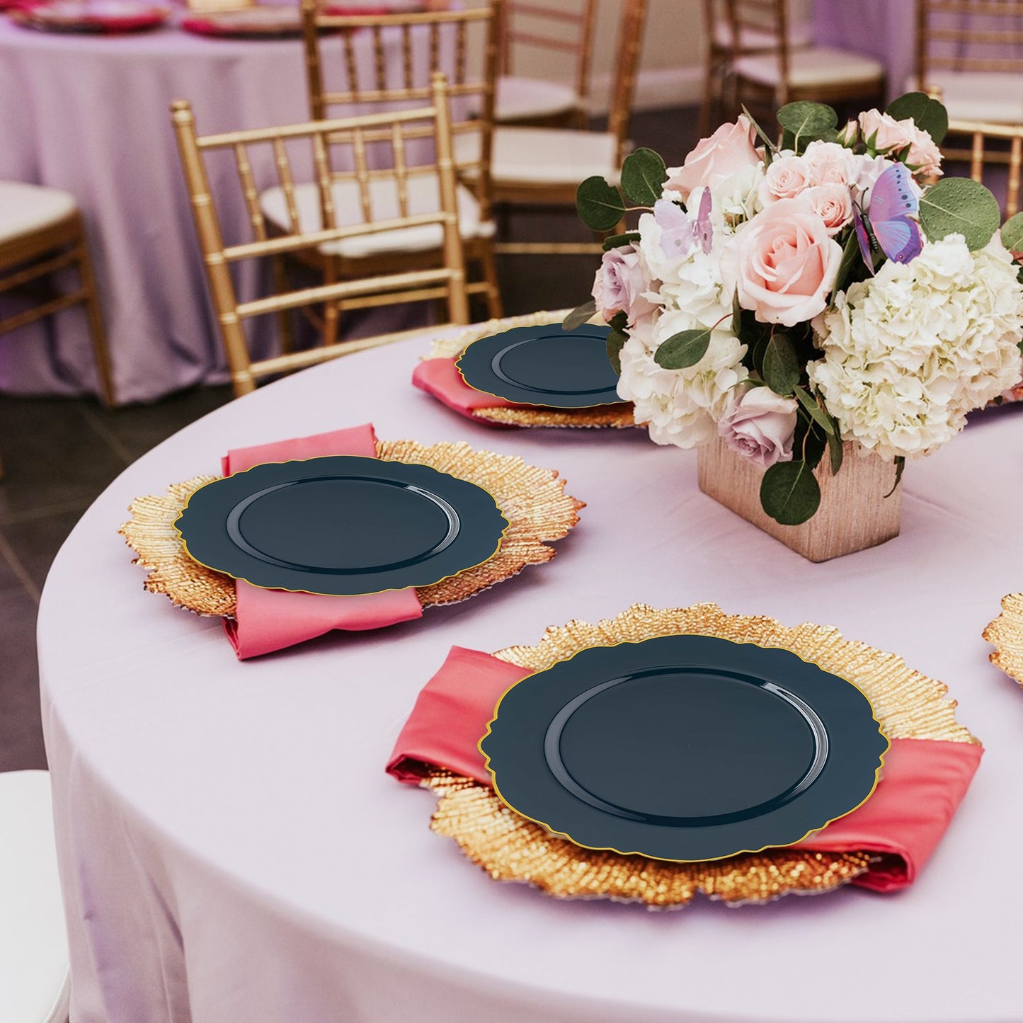 Whether casual or formal, Navy with Gold Rim Round Blossom Disposable Plastic Appetizer/Salad Plates enhances food presentation with a premium yet disposable design
