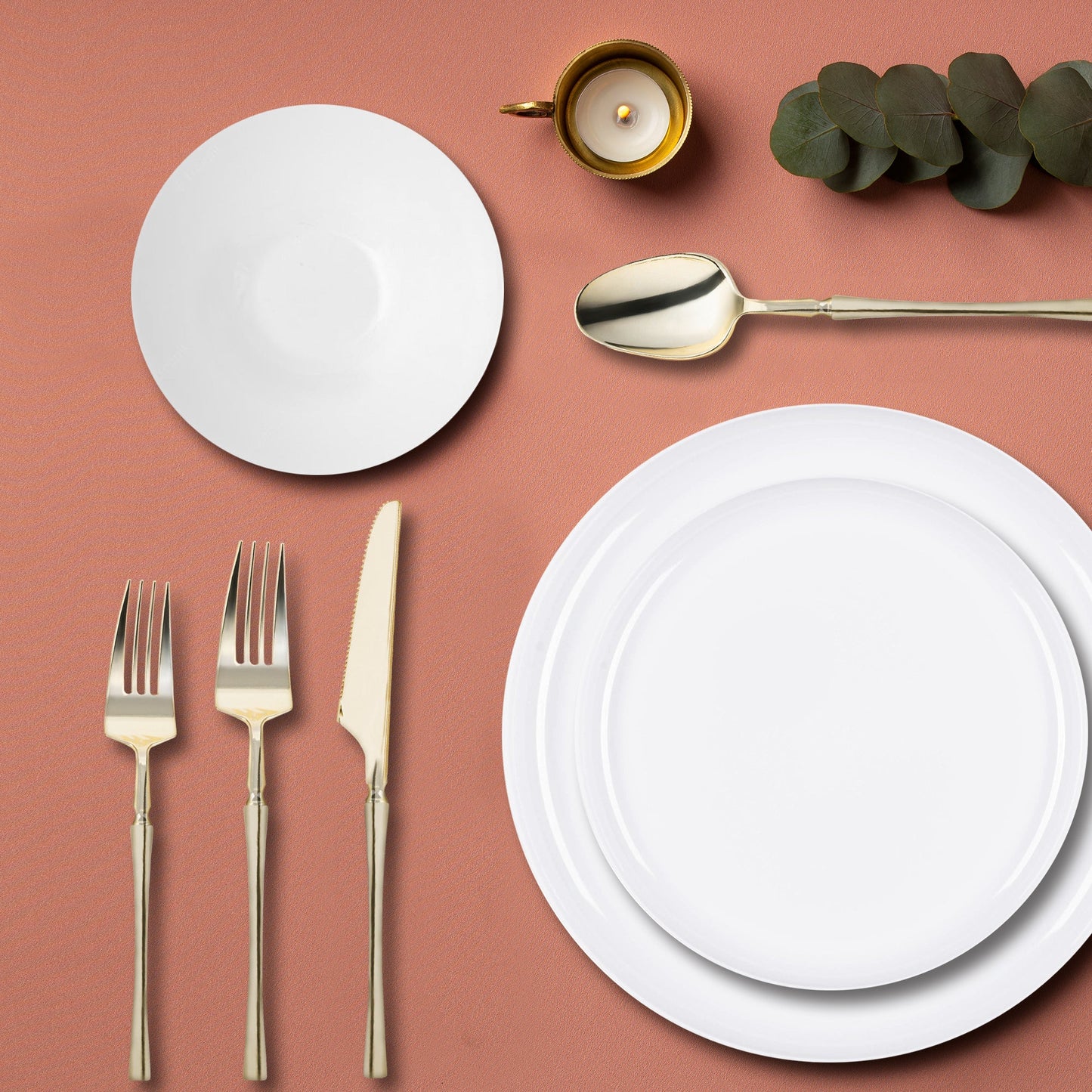 White Flat Round Disposable Plastic Tableware Set used for serving entrees at a formal dinner.