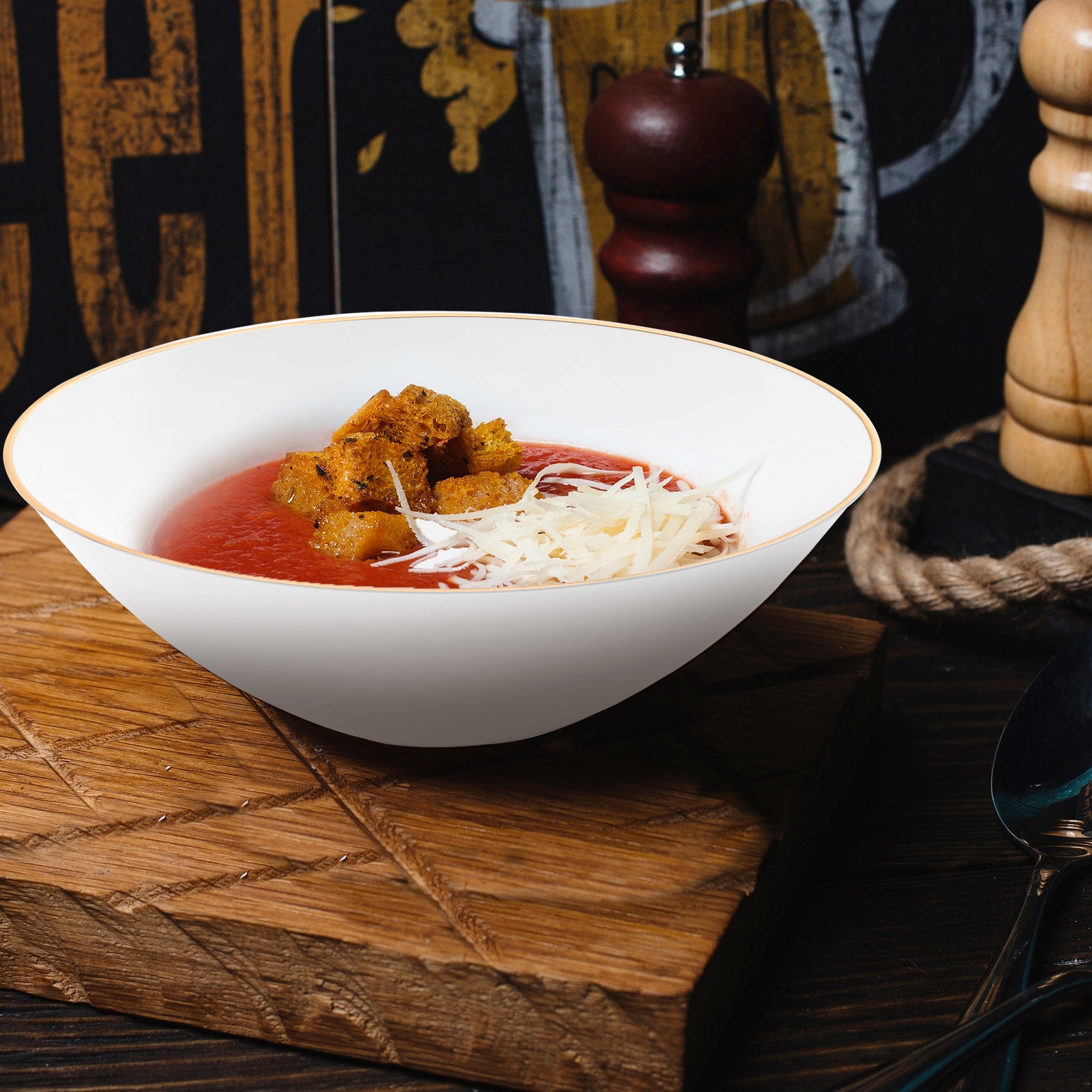 White with Gold Rim Organic Round Disposable Plastic Soup Bowl (16 oz.) containing a serving of fluffy white rice.