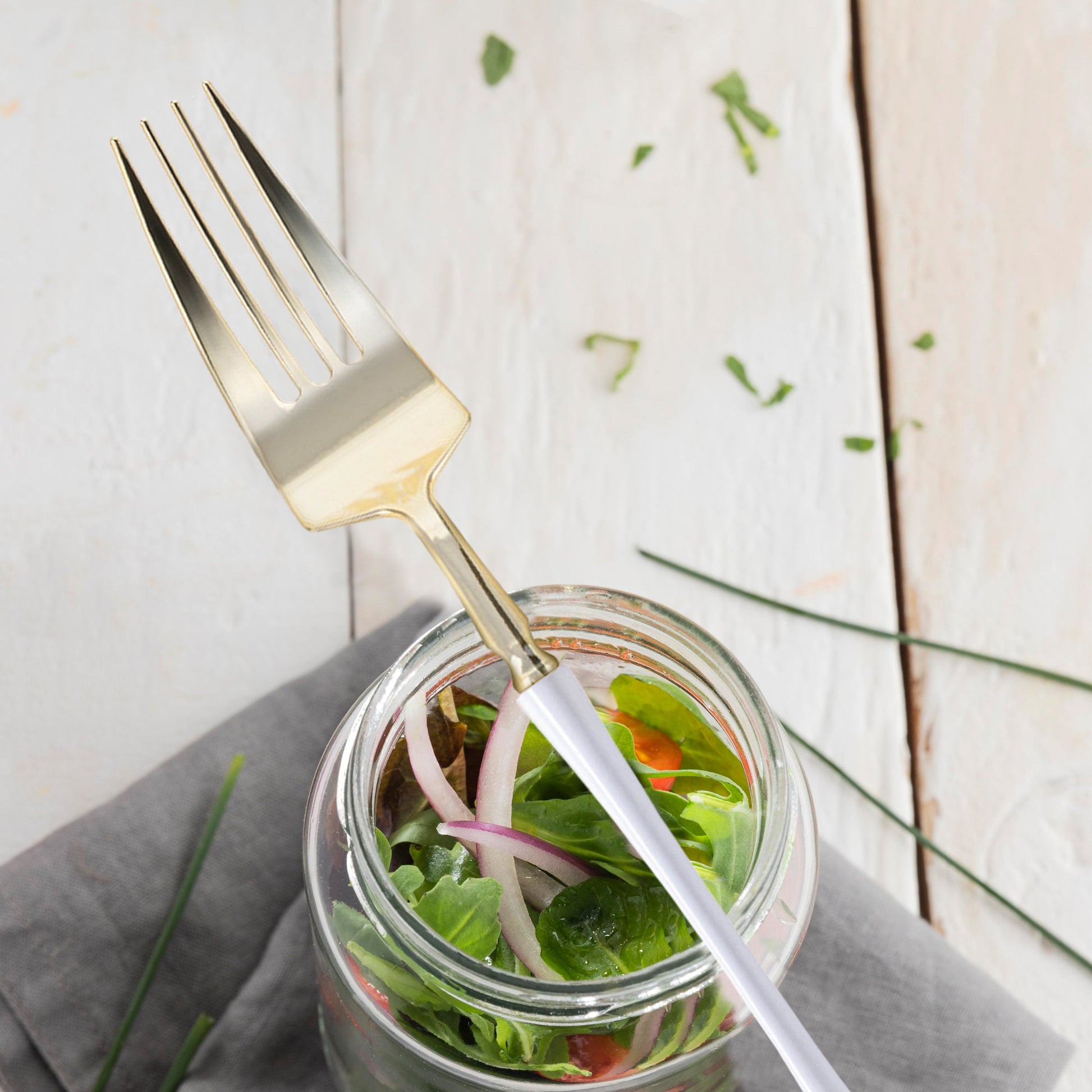 perfect blend of elegance and durability for entertaining Gold with White Handle Moderno Disposable Plastic Dinner Forks